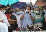 Congress party leader Rahul Gandhi, with leaders of opposition parties, addresses reporters on the Pegasus spyware project, outside the Parliament in New Delhi on July 28, 2021. Opposition parties asked whether the Indian government had bought Pegasus, a hacking software developed by the Israeli company NSO Group.