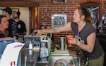 Bartender Jordan Lewis mixes drinks on June 8, 2022, at J-DUB Bar in Bend. Her workplace, like others, has struggled to find enough employees to meet the summer demand.