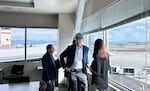 Sen. Ron Wyden, center, speaks with airport director Amber Judd at the Rogue Valley International Airport in Medford on Monday, Aug. 18, 2025.