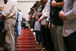 A boy during prayer at the Muslim Educational Trust building in Southwest Portland on Saturday, May 27, 2017. Planned Ramadan celebrations at the center took on new tones following the MAX attack.