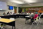 Members of Portland State University's Board of Trustees listen to student and faculty concerns over administrators' plans to solve the university's budget crisis on Nov. 21, 2024.