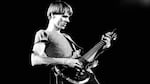 Tom Verlaine of Television performs on stage at Hammersmith Odeon, London, 28 May 1977. He is playing an Ampeg Dan Armstrong guitar. (Photo by Gus Stewart/Redferns)