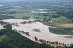 An aerial view of flood damage left by Hurricane Helene along the Nolichucky River, Saturday, Sept. 28, 2024