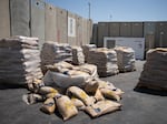 Food is stacked on pallets on the Israeli side of the border crossing with Gaza, which is enduring a humanitarian crisis. Israel says the bottleneck is on the Gaza side.