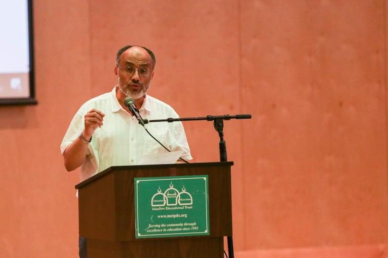 Muslim Educational Trust President Wajdi Said addresses hundreds who showed up to the trust in Southwest Portland for planned Ramadan celebrations.