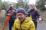 Geoff Babb hikes with help from his friends Jack Arnold and Amy Kazmier. 