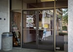 The Oak Lodge branch of the Clackamas County Library in Oak Grove, Ore., alerts patrons that it's closed on Wednesday, April 29, 2020. Clackamas County closed its public libraries due to the ongoing coronavirus pandemic.