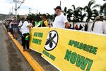 People calling for slavery reparations protest outside the entrance of the British High Commission during the visit of the Duke and Duchess of Cambridge in Kingston, Jamaica, earlier this year.