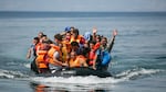 A dinghy arrives on the northern shore of the Greek island of Lesbos. This arrival is composed predominantly of Syrians. Each arrival carries 40-50 people, who pay smugglers $1,200-$1,500 Euros each to supply them with a dinghy. The smugglers do not bring the refugees from Turkey to Greece; they simply point them towards Greece, turn on the outboard engine, and shove them into the sea. 