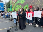 Lydia Gray-Hollifield speaks out in support of Multnomah County's Preschool for All program outside of Escuela Viva in Southeast Portland on June 25, 2025.