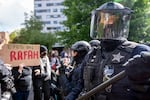 FILE - Law enforcement teams clear protesters from Portland State University’s Branford Price Millar Library, May 2, 2024. 