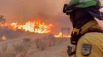This image made from video provided by INFOCA shows firefighters battling a wildfire near Los Gallardos, Almeria, Spain, on Thursday.