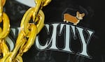 Becky Mathisen Shay wears a pin of Pancake, Portland Fire center Megan Gustafson’s corgi at the Moda Center in Portland, Ore., on July 9, 2026. Gustafson's corgi, Pancake, has become famous among Portland Fire fans.