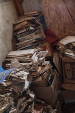 Documents gather dust in decaying boxes in Carol Van Strum's shed in the Siuslaw National Forest. For decades, Van Strum has been amassing documents about the chemical industry through lawsuits and Freedom of Information Act requests.