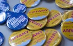 Campaign buttons for Portland City Council District 3 City Councilors Tiffany Koyama Lane and Angelita Morillo at an event, Sept. 19, 2026.