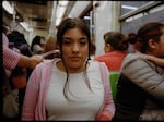 A young girl travels in the metro's women-only section in December 2023.