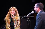 Photographer Holly Andres greets "Think Out Loud" host David Miller.