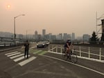 Smoke from the Eagle Creek wildfire darkens the skies in downtown Portland.