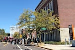 Portland Police, Portland Fire & Rescue, and Portland Public Schools officials meet outside of Benson Polytechnic High School in Northeast Portland on Tues., Sept. 8, 2026. 