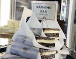 Gluten-free Nanaimo bars in a revolving display case at Lauretta Jean's bakery in Portland, Ore., on May 27, 2026.