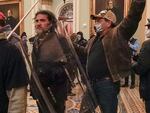 Rioters, including Dominic Pezzola, center with police shield, are confronted by U.S. Capitol Police officers outside the Senate Chamber inside the Capitol on Jan. 6, 2021, in Washington.