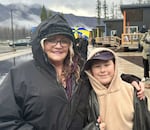 Yvette Oyervides, left, lost her home of 22 years in the Holiday Farm fire in 2020. She hopes to move into one of the modular homes at Lazy Days. Here, she's pictured hugging her grandson Parker Crabb.