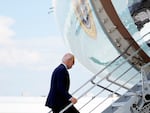 President Biden boards Air Force One as he departs Harry Reid International Airport in Las Vegas, Nevada, on July 17, 2024, en route to Delaware, after testing positive for COVID.