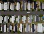 A car drives through The Altramar 1 Mobile Home Community on June 18, 2026 in Milwaukie, Ore.