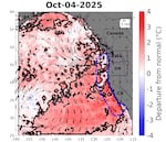On Oct. 4, 2025, a blob of abnormally warm water (marked in red inside bold black lines) reached the Alaska, British Columbia and California coasts, but stayed offshore from most of Oregon and Washington. Arrows indicate wind, while numbered lines show atmospheric pressure. The U.S. Exclusive Economic Zone is marked by a blue dashed line.