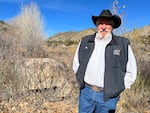 West of Glenwood Canyon, retired Colorado game warden Perry Will stands at a popular fishing access area along Interstate 70.