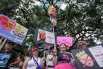 People gather in Houston for the "No Kings" nationwide demonstration on Saturday, June 14, 2025. (Raquel Natalicchio/Houston Chronicle via AP)