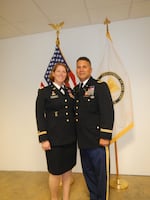 In this provided photo, Michelle Stewart and her husband, Bryan Stewart, pose for a photo during her retirement ceremony as Chief of Staff at the Arlington National Cemetery on July 25, 2014. Both Michelle and Bryan Stewart retired with the rank of colonel after a combined nearly 60 years of service in the U.S. Army. They currently live in Battle Ground, Wash.