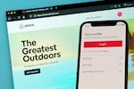 FILE - The login page for Airbnb's iPhone app is displayed on a computer displaying Airbnb's website, May 8, 2021, in Washington.