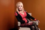FILE - Dolly Parton poses at the Carnegie Medal of Philanthropy Ceremony in New York, on Oct. 13, 2022.