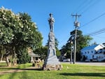 A Confederate statue in front of the courthouse in Columbia, N.C., with a plaque on the bottom that reads: “IN APPRECIATION OF OUR FAITHFUL SLAVES.”