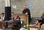 Perrydale superintendent and high school principal Dan Dugan speaks at the high school’s graduation on June 6, 2026 held in Amity, Ore. Perrydale is one of 19 Oregon school districts with a 100% graduation rate in 2025.