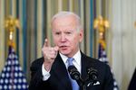 President Joe Biden responds to a question about the U.S. border as he speaks in the State Dinning Room of the White House.