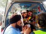 In this photo provided by Rescue 1122 Head Quarters, rescue workers carry a wounded man after a bomb explosion in the Bajur district of Khyber Pakhtunkhwa, Pakistan on Sunday.