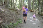 Tim Billo, a lecturer at the University of Washington's College of the Environment, often frequents Seattle's Seward Park with his daughters, Ellie and baby Emma.