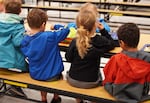 Kindergarteners at Durham Elementary School in Tigard, Ore., eat a free lunch on Oct. 15, 2024. Oregon lawmakers plan a proposal to make school meals free for all.