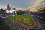 In this Sept. 29, 2020, file photo, players and coaches for the New York Yankees and the Cleveland Indians stand for the national anthem before Game 1 of an American League wild-card baseball series in Cleveland. The Indians are changing their name after 105 years.