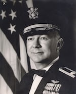 The adoptee's father served in the military.