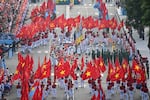 Participants perform during a parade marking the 50th anniversary of the fall of Saigon and the end of the Vietnam War in Ho Chi Minh City on April 30, 2025.