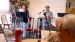 Richard Kwong (right, background) practices Cantonese opera with fellow Yat Sing members at the Portland Chinatown Museum on June 9, 2024.