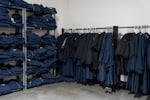 Workers' coveralls are stored at the facility.