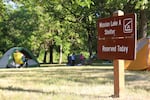 FILE - The Mission Lake A Shelter campsite in the Willamette Mission State Park in Oregon in June 29, 2018.