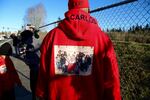 Many family and community members wore clothing with photos of Carlos Hunter to honor his memory.