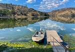 The reservoir above Copco 1 Dam, known as Copco Lake, will be drained before dam removal, exposing land that may be returned to the Shasta Indian Nation.