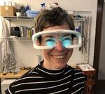 University of Oregon psychology professor Melynda Casement sports a pair of light therapy glasses, which she says reinforces or changes the wearer's circadian rhythms. "Morning light can help shift circadian rhythms to an earlier schedule, which is called a phase advance," she explained to KLCC.