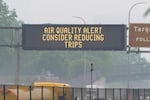 A sign warns of an air quality alert as smoke from wildfires burning in Canada reaches Minneapolis on Tuesday.
